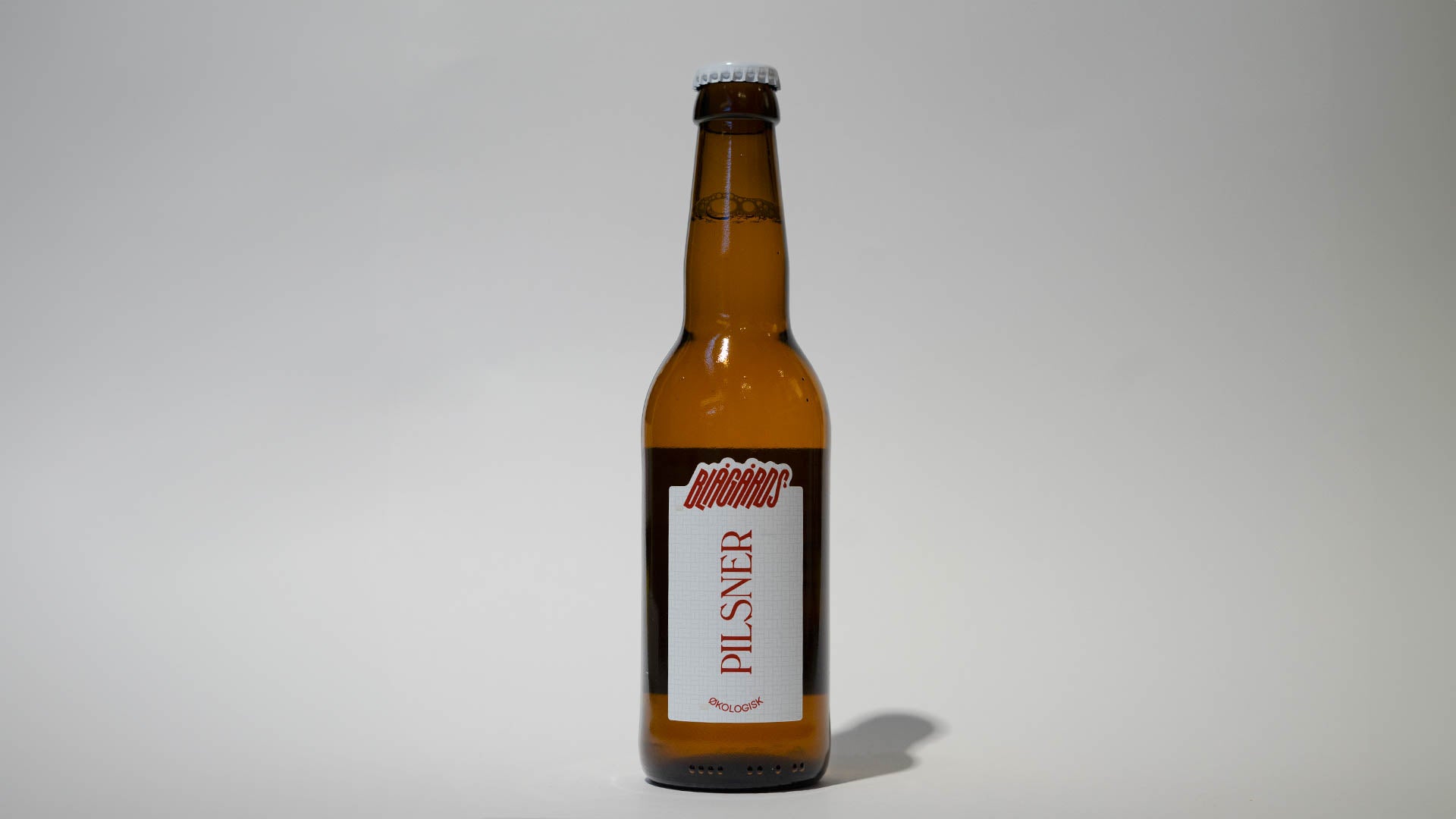Blågårds øl pilsner øko på 33cl flaske fra Nørrebrew