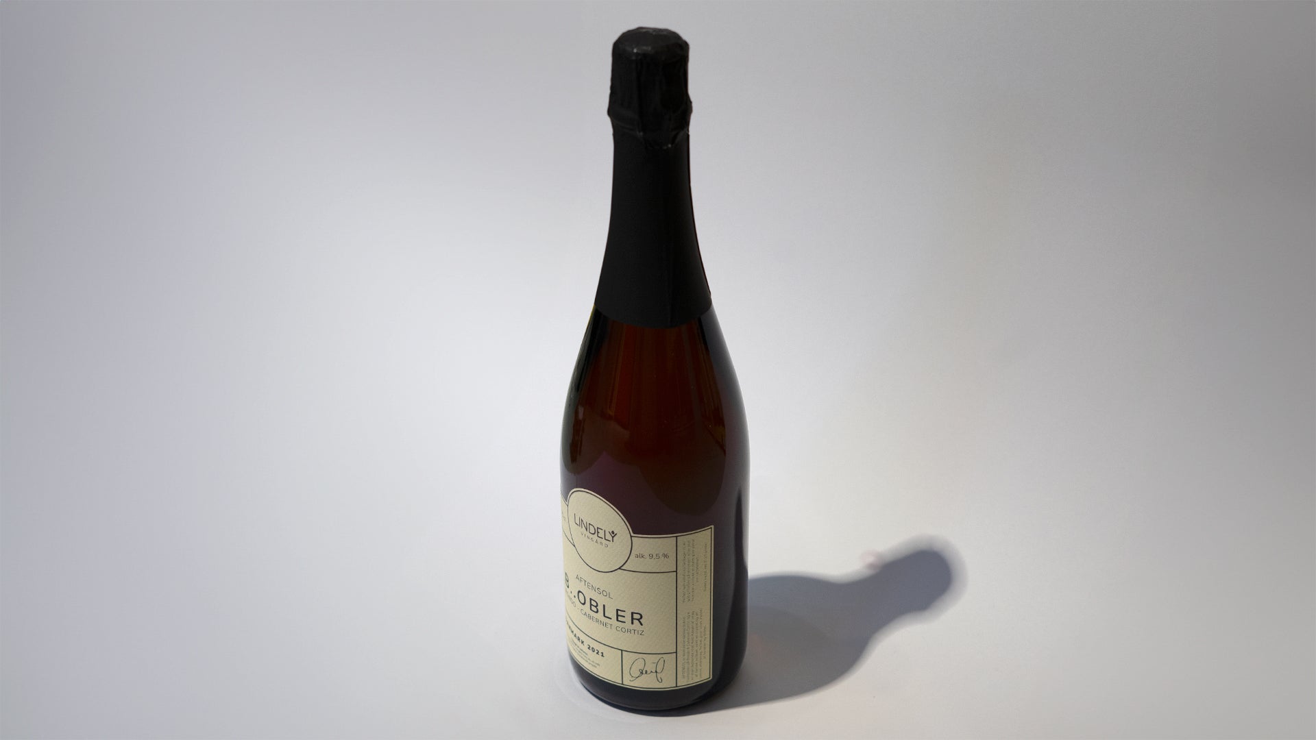 Lindely - Aftensol, bobler, 75 cl