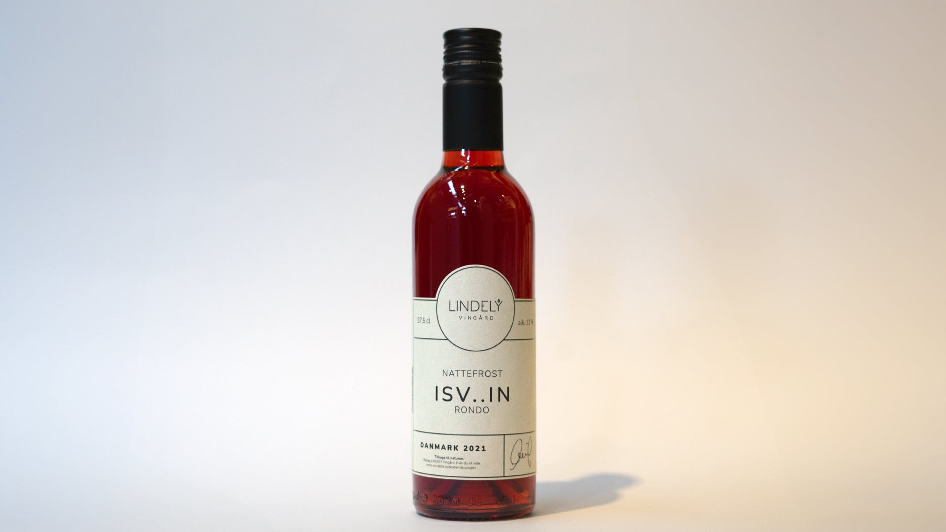 Flaske med Lindely Nattefrost isvin - sød vin lavet af frosne druer