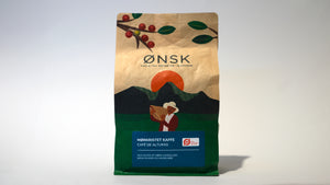 ØNSK Mørkristet Café del Alturas øko pose med bønner i blå etikette